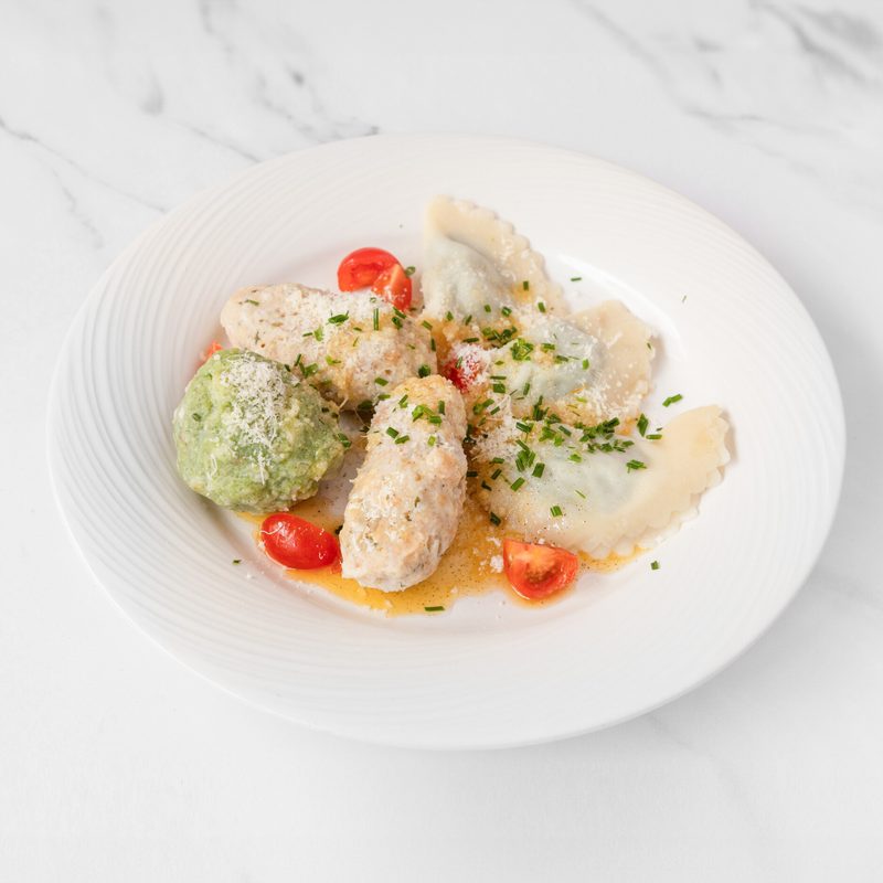 Tris – Spinatknödel, Schlutzkrapfen und Kasnocken mit brauner Butter